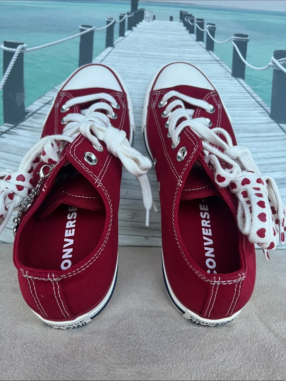Converse Women's Low Top Sneakers in Burgundy with Heart-Print Laces